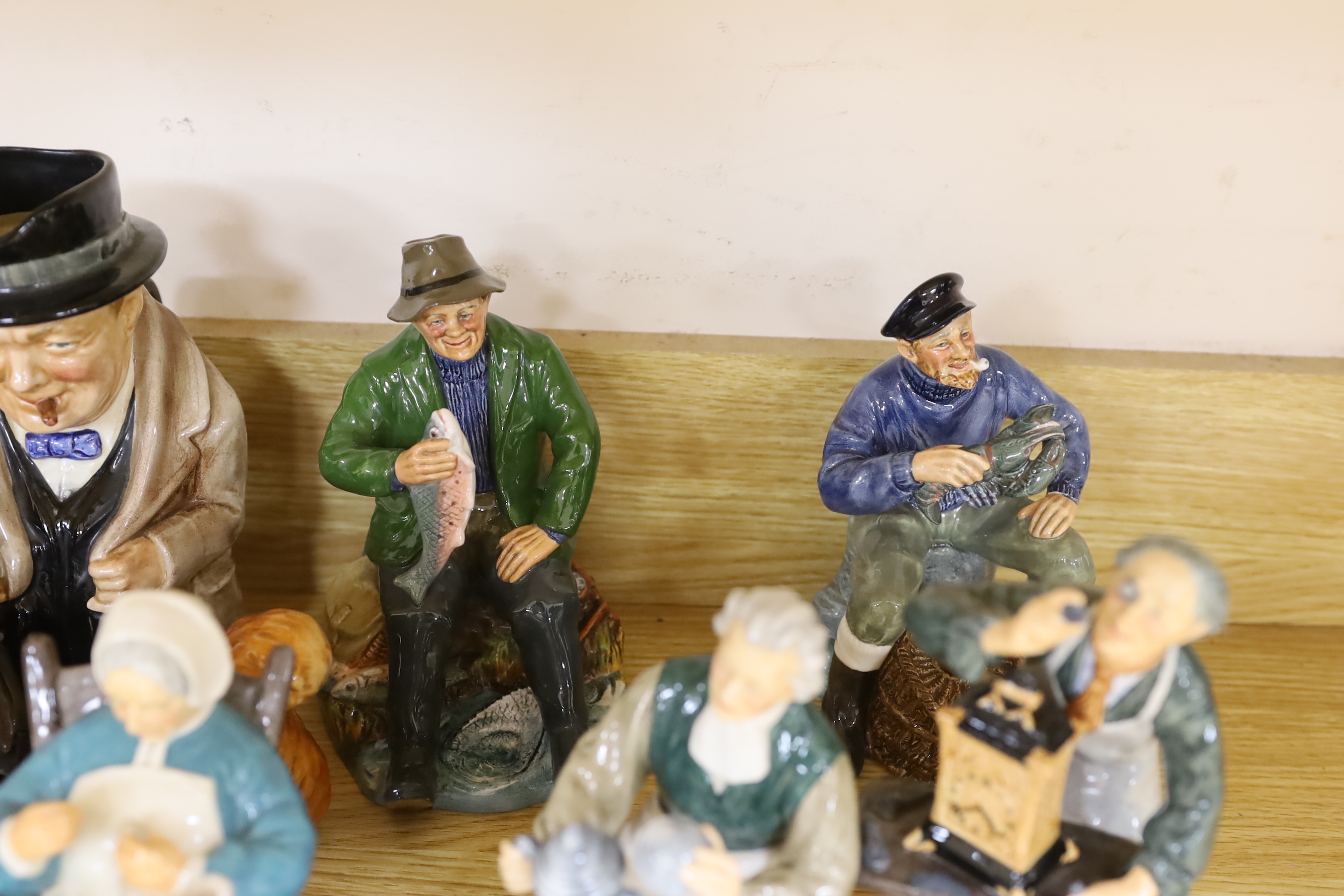 A collection of Royal Doulton figurines